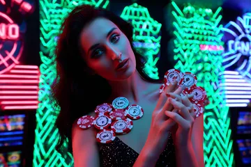 A stylish woman beside vibrant slot machines displaying glowing sevens, showcasing the variety of top slots at 777ZK.