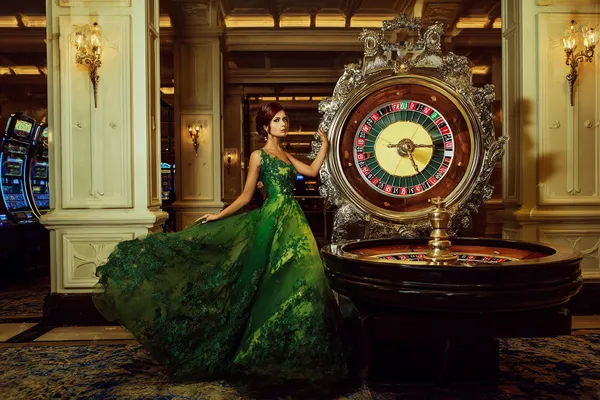 A close-up shot of golden coins falling around a spinning roulette wheel, representing immersive casino action at 777ZK.